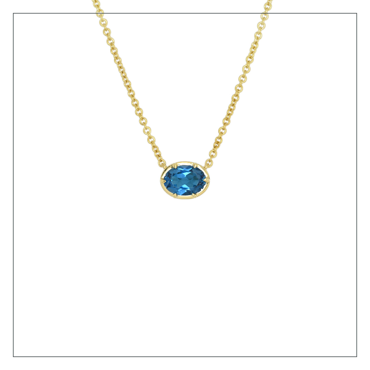 9kt Gold London blue topaz necklace
